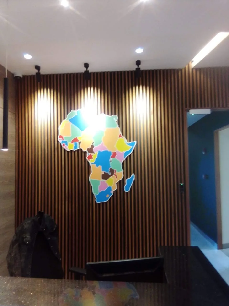 Reception sign-a map of africa on a wall