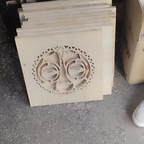 Decorative wooden panel with intricate laser-cut design for home decor.