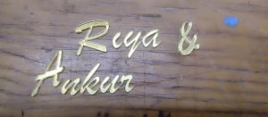 laser cut small name on gold mirror acrylic