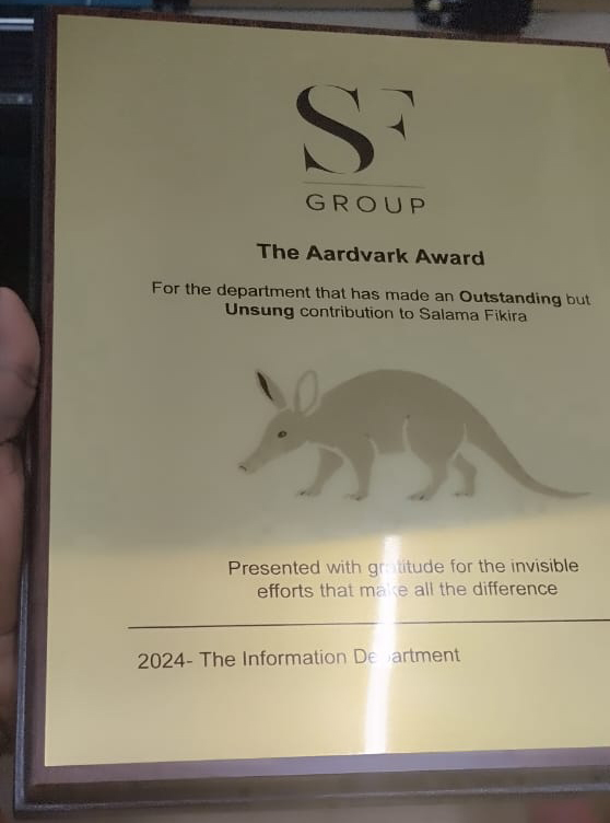 photo of a gold aluminum printed plaque