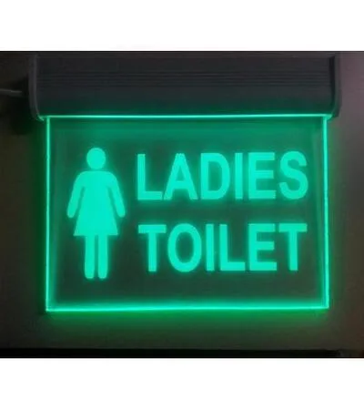 illuminated ladies toilet sign