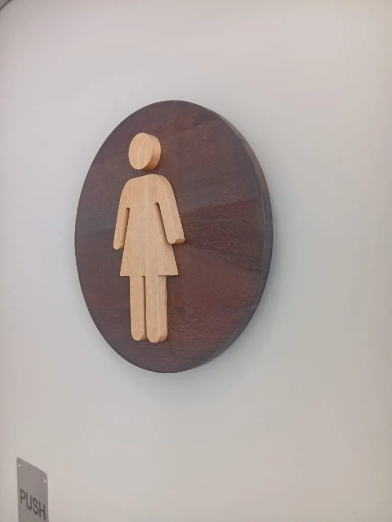 Wooden ladies toilet sign